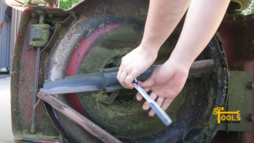 sharpen lawn mower blades with grinder